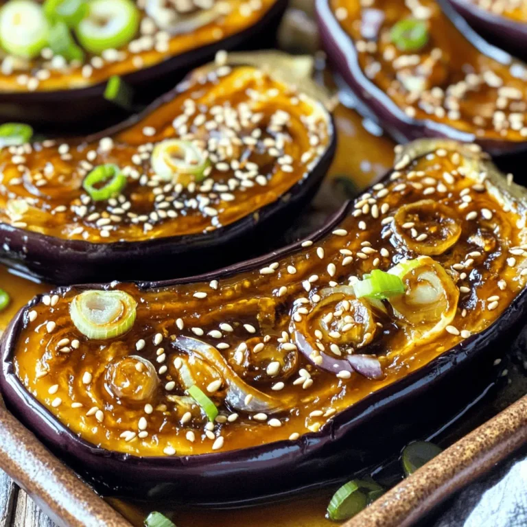 To make miso glazed eggplant, gather these items: - 2 medium eggplants - 3 tablespoons white miso paste - 2 tablespoons maple syrup or honey - 1 tablespoon sesame oil - 2 tablespoons soy sauce (or tamari for gluten-free) - 1 teaspoon rice vinegar - 1 tablespoon grated fresh ginger - 2 cloves garlic, minced - 1 tablespoon sesame seeds (for garnish) - 2 green onions, finely sliced (for garnish) These ingredients work together to create a rich and savory glaze. The eggplant absorbs the flavors well, making each bite delicious. You can add a few items to boost the taste: - Chili flakes for heat - Fresh herbs like cilantro or basil - A splash of citrus juice for brightness These extras can take your dish to the next level. Even small tweaks can add exciting flavors. When picking eggplants, look for these signs: - Choose firm, shiny skins without blemishes. - The color should be deep purple or glossy black. - Smaller eggplants tend to be less bitter and more tender. Fresh eggplants will make your dish taste great. Always check for quality before buying. Start by preheating your oven to 400°F (200°C). This ensures the eggplants cook evenly. Next, take your medium eggplants and slice them in half lengthwise. Make sure to cut all the way through the flesh but not the skin. A crisscross pattern works best. This allows the glaze to soak in well. Place the eggplant halves on a cutting board, cut side up, and get ready for the glaze. In a medium bowl, mix 3 tablespoons of white miso paste with 2 tablespoons of maple syrup or honey. The sweetener balances the salty miso. Add 1 tablespoon of sesame oil for a nutty flavor. Then, pour in 2 tablespoons of soy sauce and 1 teaspoon of rice vinegar. These ingredients enhance the glaze's depth. Finally, add 1 tablespoon of grated fresh ginger and 2 cloves of minced garlic. Whisk everything until it is smooth. This creamy glaze will add tons of flavor to the eggplant. Now it’s time to bake! Brush the miso glaze generously over the cut sides of the eggplant halves. Make sure the glaze seeps into the scored flesh. Place the eggplant cut side up on a lined baking sheet. Bake them for about 25 to 30 minutes. This will make them tender and caramelized. Halfway through, take them out and brush on any remaining glaze. Once done, let them cool a bit before serving. For the final touch, sprinkle sesame seeds and sliced green onions on top. Enjoy this flavorful dish! You can check the [Full Recipe] for more details. To get the best texture, choose medium eggplants. They should feel firm and heavy. Next, score the flesh lightly. This step helps the glaze soak in well. Bake them until tender but not mushy. The eggplant should have a slight bite for great texture. Some eggplants can taste bitter. To reduce bitterness, sprinkle salt on the eggplant after cutting. Let them sit for about 20 minutes. This process draws out extra moisture and bitterness. Rinse them well with water and pat dry with a paper towel to remove excess salt. You can prepare the miso glaze in advance. Mix the miso paste, maple syrup, sesame oil, soy sauce, rice vinegar, ginger, and garlic in a bowl. Store the glaze in the fridge for up to a week. Just remember to stir it before using. This way, you save time on busy cooking days. For the full recipe, check out the details above. {{image_2}} Miso glazed eggplant is already a great choice for both vegetarians and vegans. The main ingredient, eggplant, adds rich flavor. The miso glaze provides umami, making it tasty and satisfying. If you want a vegan twist, use maple syrup instead of honey. You can also add more vegetables. Try bell peppers or zucchini alongside the eggplant. They will soak up the glaze and add more color. When serving miso glazed eggplant, think about what to pair it with. It goes well with rice or quinoa for a hearty meal. The grains soak up the glaze and balance the dish. You can also serve it with a fresh salad to add crunch. For a complete meal, add some protein, like tofu or chickpeas. If you don’t have miso paste, don’t worry. You can use tahini or peanut butter as a substitute. Both add creaminess and flavor. For a different taste, try tahini mixed with lemon juice. This will give the dish a nice zing. If you need it gluten-free, use tamari instead of soy sauce. These simple swaps keep the dish delicious and exciting. For the full recipe, check out the details above! To keep your leftover miso glazed eggplant fresh, place it in an airtight container. Make sure it cools completely before sealing it. Store it in your fridge for up to three days. This method helps maintain its texture and flavor. If you plan to eat it later, slicing the eggplant before storing can help with portion control. When you're ready to enjoy the leftovers, you can reheat the eggplant. The best way is to use an oven. Preheat your oven to 350°F (175°C). Place the eggplant on a baking sheet lined with parchment paper. Reheat it for about 10-15 minutes. This method keeps the eggplant warm and helps revive its nice, caramelized edges. You can also use a microwave for quick reheating. Just microwave for 1-2 minutes, but it may lose some texture. You can freeze miso glazed eggplant, but it's best to do so before cooking. Halve and score the eggplants, then coat them with the miso glaze. Place the glazed halves in a freezer bag. Make sure to remove as much air as possible. You can freeze them for up to three months. When you’re ready to cook, thaw them overnight in the fridge and bake as usual. This way, you keep that great flavor and texture! For the full recipe, check out the earlier section. Miso is a thick paste made from fermented soybeans. It has a salty, umami flavor. You can find different types of miso, like white, red, and yellow. Each type brings a unique taste to dishes. I love using miso for its depth. It enhances the flavor of vegetables, meats, and soups. Miso adds richness without needing heavy sauces. Plus, it’s packed with probiotics, which are great for gut health. Yes, you can! This glaze is very versatile. Try using zucchini, mushrooms, or cauliflower. These veggies soak up the glaze well. Just remember to adjust cooking times. Some vegetables cook faster than eggplant. For example, zucchini may need less time in the oven. Always check for tenderness. The goal is to have a nice caramelization on the outside. Making this dish gluten-free is easy! Just replace regular soy sauce with tamari. Tamari is a gluten-free soy sauce alternative. Be sure to check the miso label too. Some brands may contain gluten. Look for miso that is labeled gluten-free. This way, you can enjoy the dish without worry. In this article, we covered how to make miso glazed eggplant. We discussed the key ingredients and tips for choosing the best eggplants. I shared step-by-step instructions for prepping, glazing, and baking the dish. We explored ways to enhance flavor and ways to adapt the recipe for different diets. Lastly, we looked at storage and reheating tips. Miso glazed eggplant is simple and tasty. You can enjoy it in many ways. Try it out and savor the flavors!