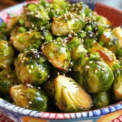 - 1 pound Brussels sprouts, trimmed and halved - 3 tablespoons honey - 2 tablespoons soy sauce - 2 cloves garlic, minced - 1 tablespoon olive oil - 1/2 teaspoon red pepper flakes - Sesame seeds for garnish - Chopped green onions for garnish - Salt - Pepper When making honey garlic Brussels sprouts, you need fresh Brussels sprouts. Choose ones that are firm and bright green. The sweetness from honey balances the saltiness of soy sauce, making a great flavor. Minced garlic adds a nice kick. Olive oil helps everything stick and adds richness. For a bit of heat, add red pepper flakes. This is optional, but I think it’s a fun touch. Sesame seeds and green onions are great for garnishing. They add color and a nice crunch. Don’t forget salt and pepper! They are key to making your dish tasty. Adjust these to suit your taste. Now that you know what you need, you are ready to make a tasty dish. - Preheat the air fryer to 375°F (190°C) for about 5 minutes. - In a large bowl, mix 3 tablespoons of honey, 2 tablespoons of soy sauce, and 2 minced garlic cloves. Add 1 tablespoon of olive oil, 1/2 teaspoon of red pepper flakes, salt, and pepper. Whisk until smooth. - Add the halved Brussels sprouts to the bowl. Toss them well in the honey garlic mixture until they are coated evenly. - Place the Brussels sprouts in the air fryer basket in a single layer. This helps them cook evenly. - Air fry the Brussels sprouts for 12-15 minutes. Shake the basket halfway through to ensure they crisp up nicely. - Once they are golden brown, take them out and transfer to a serving dish. - Garnish with sesame seeds and chopped green onions for a colorful finish. For extra flair, drizzle with more honey before serving. To get that perfect crispy texture, lay the sprouts flat in a single layer. This step is key! If they are too crowded, they will steam instead of fry. Shake the basket halfway through cooking; this helps them crisp up evenly. The more air they get, the better! You can add a twist to your honey garlic mix. Try adding some ginger for warmth or lime juice for a zesty kick. If you want more sweetness, add an extra tablespoon of honey. Taste as you go! Adjusting sweetness can change the dish to match your mood. You can prep Brussels sprouts in advance for an easy meal. Toss them in the honey garlic sauce and store in the fridge for up to a day. When you're ready, just air fry them straight from the fridge. This saves time and makes it super easy to enjoy a tasty side dish! {{image_2}} You can add chicken or tofu for more protein. If you choose chicken, cut it into small pieces. Mix it in the honey garlic sauce with the Brussels sprouts. Cook everything together in the air fryer. Chicken adds a savory taste, while tofu gives a soft texture. Both options make your meal heartier. Try adding other veggies like carrots or bell peppers. They add color and taste. Cut them into small chunks, just like the Brussels sprouts. Toss them in the same honey garlic mixture. This adds a nice crunch and a fresh flavor to your dish. You can also mix in some mushrooms for a unique taste. Experiment with different sauces to change the flavor. You might try teriyaki sauce or balsamic glaze. These sauces can bring a new twist to your Brussels sprouts. Just mix them into your honey garlic sauce. This way, you can create a dish that suits your taste buds perfectly. Store your leftover honey garlic Brussels sprouts in an airtight container. This keeps them fresh. Make sure to cool them down first. They can last up to three days. If they start to smell or look odd, it's best to toss them out. To reheat, use your air fryer or oven. Set your air fryer to 375°F (190°C). Heat for about 5 to 7 minutes. This helps keep them crispy. You can also use the microwave, but they may not be as crunchy. If you do, heat in short bursts, checking often. Yes, you can freeze Brussels sprouts. However, it's best to freeze them before cooking. Trim and halve them, then blanch in boiling water for 2-3 minutes. After cooling, place in a freezer bag. When ready, thaw and cook as normal. Cooked Brussels sprouts can lose their texture when frozen, so plan ahead! You should air fry Brussels sprouts for about 12 to 15 minutes. This time gives you a nice, crispy texture. Make sure to shake the basket halfway through cooking. This step helps the sprouts cook evenly. If you like them extra crispy, add a minute or two. Yes, you can use frozen Brussels sprouts. They are convenient and save time. However, frozen sprouts may not get as crisp as fresh ones. You may need to increase the cooking time. Thaw them first for better results. Honey garlic Brussels sprouts pair well with many dishes. They go great with grilled chicken or salmon. You can also serve them with rice or quinoa for a hearty meal. Adding a fresh salad can balance the flavors. Enjoy your meal with a side of roasted potatoes or garlic bread for extra comfort. In this post, we explored how to make delicious honey garlic Brussels sprouts. We covered main and optional ingredients, seasoning tips, and step-by-step instructions. I shared tricks for crispy texture and flavor variations, plus storage info and reheating tips. You can enjoy this dish solo or as a fun side. Experimenting with protein or other veggies can take it to new heights. Now, dive into the kitchen and enjoy making your own tasty creation!