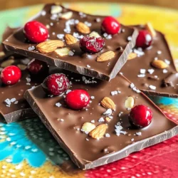 - 2 cups dark chocolate chips - 1 cup dried cranberries - 1 cup roasted almonds, roughly chopped - ½ teaspoon sea salt - 1 tablespoon coconut oil (optional, for a glossy finish) - ½ teaspoon vanilla extract (optional) For this no-bake treat, I love using dark chocolate chips. They give a rich taste and melt perfectly. You can find these in any grocery store. The dried cranberries add a sweet and chewy texture. They pair well with the crunch of roasted almonds. Roasting almonds brings out their flavor. You can buy them pre-roasted or roast raw almonds at home. Just keep an eye on them so they don’t burn. Sea salt provides a nice contrast to the sweetness. It really helps to enhance the flavors. Coconut oil is optional, but it helps the chocolate shine. It also makes the bark easier to break apart. Vanilla extract adds depth to the chocolate, but you can skip it if you want a simpler taste. With these basic ingredients, you can create a delightful treat that’s easy to make and share. First, line a baking sheet with parchment paper. Make sure it is big enough for the bark. This will help the bark come off easily later. Next, melt the chocolate. In a microwave-safe bowl, mix the dark chocolate chips with coconut oil if you chose to use it. Microwave this mixture in 30-second bursts. Stir after each burst until the chocolate is smooth. Be careful not to overheat, or it may burn. Now, let’s add some flavor! If you want, stir in vanilla extract after melting the chocolate. Pour the melted chocolate onto your lined baking sheet. Spread it into an even layer about ¼ inch thick. Next, sprinkle the chopped roasted almonds and dried cranberries on top. Press them in gently so they stick well. To finish, sprinkle sea salt on top for a nice contrast in taste. Place the baking sheet in the refrigerator for about 1 hour. This will help the chocolate set properly. Once it is firm, take it out. Break the bark into pieces with your hands. Now, it’s ready to enjoy! To get a smooth chocolate finish, melt the dark chocolate slowly. Use a microwave, heating in 30-second bursts. Stir well between intervals to avoid burning. Adding 1 tablespoon of coconut oil helps achieve a glossy look. This oil makes the chocolate shine and adds a nice texture. For even spreading, pour the melted chocolate onto the lined sheet. Use a spatula to spread it out. Aim for about ¼ inch thick for the perfect bite. If it is too thin, it may break easily. If too thick, it will take longer to set. Adding ½ teaspoon of vanilla extract can boost the flavor. This simple addition makes the chocolate taste richer. For a surprising crunch, try adding cacao nibs. They add a nice texture and a hint of bitterness. To balance the sweetness, sprinkle ½ teaspoon of sea salt on top. This contrast enhances the chocolate flavor. It makes each bite more enjoyable and complex. Presentation matters when serving or gifting your bark. Arrange pieces on a colorful platter for a festive touch. You can also package them in clear cellophane bags. Tie them with a ribbon for a lovely gift. For seasonal decorations, use themed wrappers or labels. Add edible flowers or sprigs of mint for a fresh look. These small touches make your chocolate bark a true delight. {{image_2}} You can switch up the nuts in your bark. Try walnuts, pecans, or cashews. Each nut brings a new taste and texture. You can also mix nuts for extra crunch. If you want a change from dark chocolate, consider white or milk chocolate. White chocolate gives a sweet, creamy flavor. Milk chocolate adds a nice touch of sweetness too. Just melt it like dark chocolate. Dried fruits can add color and flavor. Try using dried cherries, apricots, or blueberries. Each fruit pairs well with chocolate and adds a unique taste. You can also include fresh ingredients like citrus zest for zing. Mint can add a refreshing touch too. Just chop it finely and mix it in. If you need gluten-free options, this bark fits the bill! All the ingredients are naturally gluten-free. Just check the labels to be sure. For a vegan twist, use dairy-free chocolate chips. You can also skip the coconut oil if you want. The bark will still taste great! To keep your no-bake cranberry almond chocolate bark fresh, store it in an airtight container. This helps prevent moisture and keeps it tasting great. You can layer pieces of bark with parchment paper to avoid sticking. Place the container in a cool, dry place, away from sunlight. This keeps the chocolate from melting or getting soft. The best temperature for storage is between 60°F and 70°F. Avoid the fridge if you can, as cold air can cause the chocolate to sweat. If you must store it in the fridge due to heat, let it come to room temperature before serving. This tasty treat lasts about two weeks when stored properly. Keep an eye on it to ensure it stays fresh. Signs of spoilage include a white film on the chocolate or a change in smell. If you notice these signs, it’s best to toss it out. Enjoy your chocolate bark while it’s fresh for the best taste! Can I use chocolate chips other than dark? Yes, you can use milk or white chocolate chips. Each type gives a different taste. Milk chocolate is sweeter, while white chocolate adds creaminess. Adjust toppings to match your choice. How do I make the chocolate shiny? To make chocolate shiny, add 1 tablespoon of coconut oil before melting. This helps the chocolate to shine after setting. Stir well, and watch it glisten! Can I freeze no-bake chocolate bark? You can freeze the bark for up to three months. Wrap it in plastic wrap or foil first. Thaw in the fridge before serving for the best texture. What to do if chocolate won’t melt smoothly? If the chocolate is lumpy, it may have overheated. Try adding a splash of coconut oil. Heat it again in short bursts, stirring often. This can help achieve a smoother texture. How to fix bark that doesn’t set properly? If the bark is soft, return it to the fridge for longer. Ensure it is cold enough. If it still doesn't set, check the chocolate quality or try re-melting and re-setting. Ideal pairings with beverages This chocolate bark pairs well with warm drinks. Try it with hot cocoa or coffee. The rich flavors complement each other perfectly. Using bark in desserts or snacks Use the bark as a topping for ice cream or yogurt. Chop it into bits for trail mix. You can also enjoy it as a sweet snack on its own. You’ve now learned how to create delicious chocolate bark with simple steps. We explored the best ingredients, steps for preparation, and tips for perfect texture and flavor. Remember, you can customize your bark with different nuts, fruits, and chocolates. Store it properly to extend freshness and enjoy it for weeks. Whether for a party or a treat for yourself, this bark is sure to impress. Now, get creative and make your own tasty version!