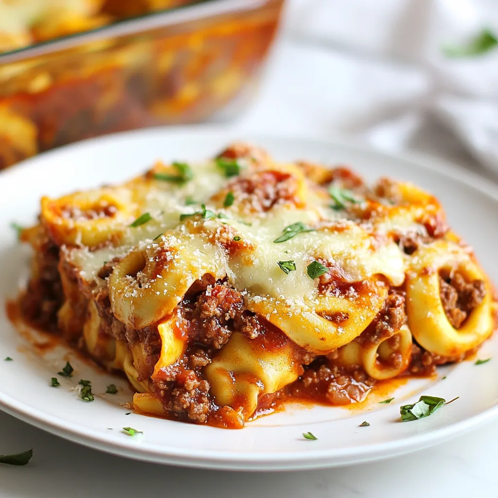 For a tasty One Pan Beefy Tortellini Bake, you will need the following: - 1 lb ground beef - 1 onion, chopped - 2 garlic cloves, minced - 1 bell pepper, diced (any color) - 2 cups marinara sauce - 2 cups beef broth - 1 package (9 oz) refrigerated cheese tortellini - 1 cup shredded mozzarella cheese - ½ cup grated Parmesan cheese - 1 teaspoon Italian seasoning - Salt and pepper to taste - Fresh basil for garnish (optional) These ingredients come together to create a warm, hearty dish. The ground beef adds protein and flavor. Chopped onion, minced garlic, and diced bell pepper bring a nice crunch and sweetness. The marinara sauce and beef broth form a rich base that coats the tortellini perfectly. Cheesy goodness comes from the mozzarella and Parmesan. Italian seasoning gives it a classic touch. Finally, a sprinkle of fresh basil adds brightness to the finished dish. This recipe balances flavors and textures, making it a hit at any dinner table. {{ingredient_image_1}} First, set your oven to 375°F (190°C). This step is key for even cooking. A hot oven helps the cheese melt and bubble nicely. Next, take a large oven-safe skillet. Place it on medium heat and add 1 pound of ground beef. Cook this for about 5-7 minutes. You want it to turn a nice brown color. If there is extra fat, drain it off. This keeps your dish from being too greasy. Now, add chopped onion, minced garlic, and diced bell pepper to the skillet. Sauté these for about 3-4 minutes. You want them to soften and smell great. The onion will become clear, and the garlic will get fragrant. Pour in 2 cups of marinara sauce and 2 cups of beef broth. Stir in a package of refrigerated cheese tortellini. Add 1 teaspoon of Italian seasoning, salt, and pepper to taste. Mix everything well and let it simmer gently for a few minutes. The tortellini will start to soften in this tasty mix. Once the tortellini is slightly soft, it’s cheese time! Sprinkle 1 cup of shredded mozzarella and ½ cup of grated Parmesan cheese on top. This will melt and create a delicious crust. Now, carefully transfer the skillet to your preheated oven. Bake for 20-25 minutes. You can watch for the cheese to become bubbly and golden brown. This is when it’s ready to come out. When you take it out, let it cool for a few minutes. If you like, add fresh basil on top for a nice touch. This step adds color and flavor. Your One Pan Beefy Tortellini Bake is now ready to enjoy! To make the beef tasty, start with good ground beef. Use 80/20 beef for the best mix of flavor and fat. Browning the beef well adds depth. Drain any extra fat after cooking. This keeps the dish from being too greasy. When using tortellini, don't overcook it. Add it to the skillet and let it simmer for about 5 minutes. This gives it a soft texture but keeps it firm. You want the tortellini to soak up the sauce but not fall apart. Cheese can change the taste a lot. I love mixing mozzarella and Parmesan. Try using smoked cheese for a unique twist. You can even add goat cheese for a tangy flavor. Play with different cheese types to find your favorite blend. Fresh herbs really brighten the dish. I like to use basil as a garnish. You can also stir in some fresh parsley or oregano before baking. These herbs add a nice aroma and make each bite more exciting. Pro Tips Use Fresh Herbs: Adding fresh basil or parsley right before serving enhances flavor and adds a beautiful touch to your dish. Choose the Right Skillet: Make sure to use an oven-safe skillet to avoid transferring the mixture to a baking dish. Customize Your Veggies: Feel free to add other vegetables like mushrooms or zucchini for extra nutrition and flavor. Make it Ahead: This dish can be prepared in advance and stored in the refrigerator for up to a day before baking. {{image_2}} You can switch out the ground beef for other proteins. Ground turkey works well and is leaner. Chicken is another tasty choice, giving a lighter flavor. For a hearty dish, try Italian sausage. Just cook it until browned, just like the beef. If you want a meatless meal, replace the beef with mushrooms or lentils. Both add great texture and flavor. You can also use plant-based ground meat for a similar taste. Don't forget to increase the seasoning to enhance those flavors. Cheese can change the whole dish. Try using cheddar for a sharp taste. You can mix in ricotta for creaminess. Feta adds a nice tang, while gouda brings a smokey flavor. Feel free to mix your favorites! Boost nutrition by adding more veggies. Spinach is a great choice; it wilts down nicely. Zucchini and carrots add sweetness and color. You can also toss in peas or corn for a pop of texture. Simply sauté them with the other veggies. After you enjoy your One Pan Beefy Tortellini Bake, let any leftovers cool. Use an airtight container to keep them fresh. Store them in the fridge for up to three days. This dish is great for quick meals later in the week. You can freeze the leftovers too! Portion them into freezer-safe containers. Make sure to leave some space for expansion. Label the containers with the date. They will stay good for up to three months. When you’re ready to eat, just thaw them overnight in the fridge. Reheating is easy! You can use the microwave or oven. If using a microwave, heat in short bursts. Stir in between to warm evenly. If using the oven, preheat to 350°F (175°C). Bake for about 15-20 minutes, or until hot. Cover with foil to keep cheese from burning. Enjoy the flavors again! You can use ground turkey or chicken instead of beef. They both work well. You can also try plant-based meat options for a vegetarian dish. Each option gives a different taste, but the recipe will still be tasty. Yes, you can use frozen tortellini. Just add a few extra minutes to the cooking time. It will still cook well in the marinara sauce. Frozen tortellini can be a great way to save time. To add some heat, try adding red pepper flakes. You can also use a spicy marinara sauce. For a bolder flavor, add diced jalapeños or hot sauce to the mix. Adjust to your heat level for a perfect kick. Yes, you can prep this dish ahead of time. Cook the beef and veggies, then combine with the sauce. Store it in the fridge for up to a day. When ready, just sprinkle cheese on top and bake. This makes weeknight dinners easier! This blog post covered key ingredients like ground beef, veggies, and cheese for a tasty dish. I shared step-by-step instructions to help you prepare and bake it just right. Tips on ensuring your beef is flavorful and your tortellini is perfect added extra value. Don't forget the many variations and storage tips to fit your needs. In my view, this recipe is both fun and flexible. You can easily make it your own. Enjoy cooking!